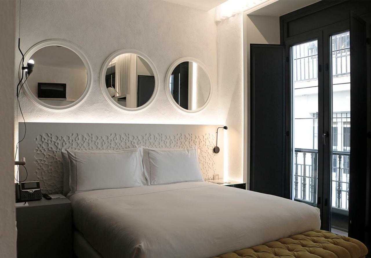 Eme Catedral Mercer Hotel Севиля Екстериор снимка A room at the hotel