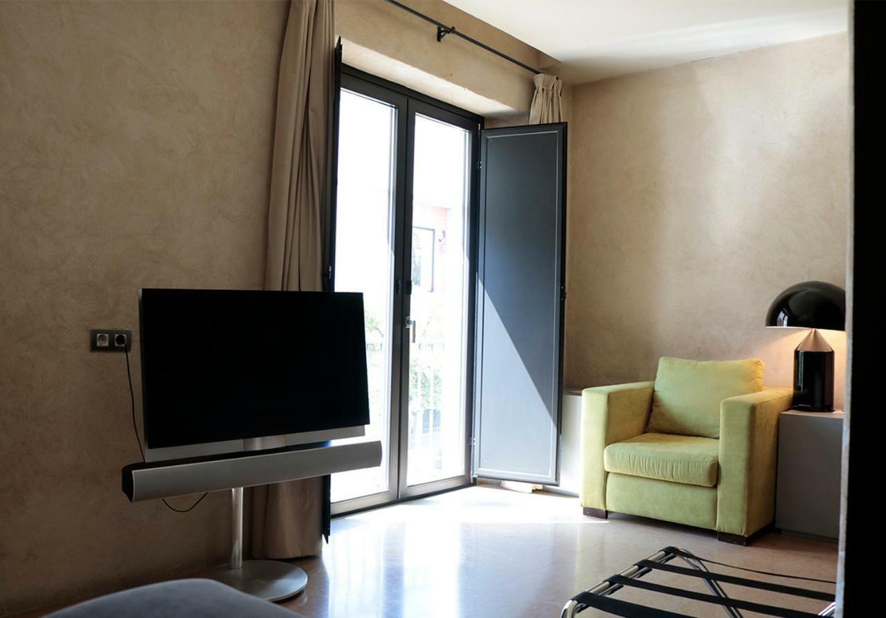 Eme Catedral Mercer Hotel Севиля Екстериор снимка A room at the hotel